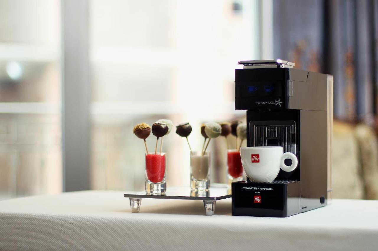 Orion Hotel Bishkek Esterno foto A Nespresso Vertuoline coffee machine