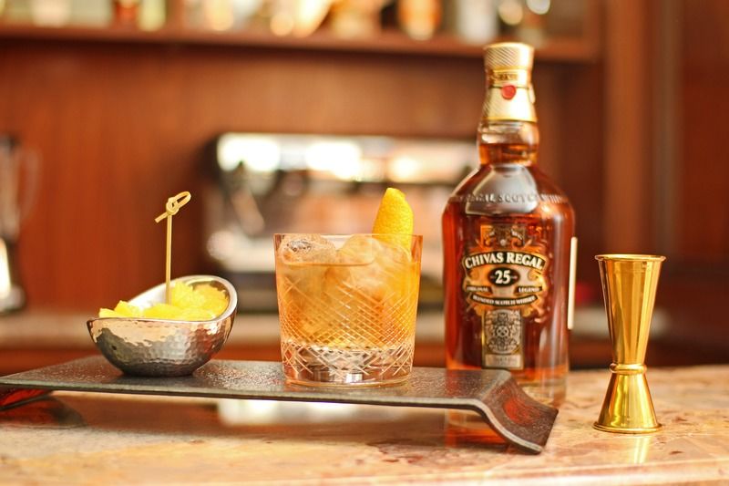 Orion Hotel Bishkek Esterno foto A bottle of 25 year old Chivas Regal