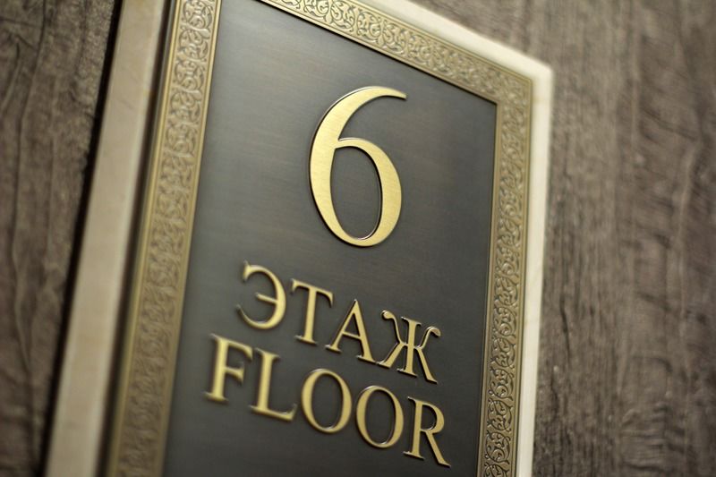 Orion Hotel Bishkek Esterno foto Floor sign