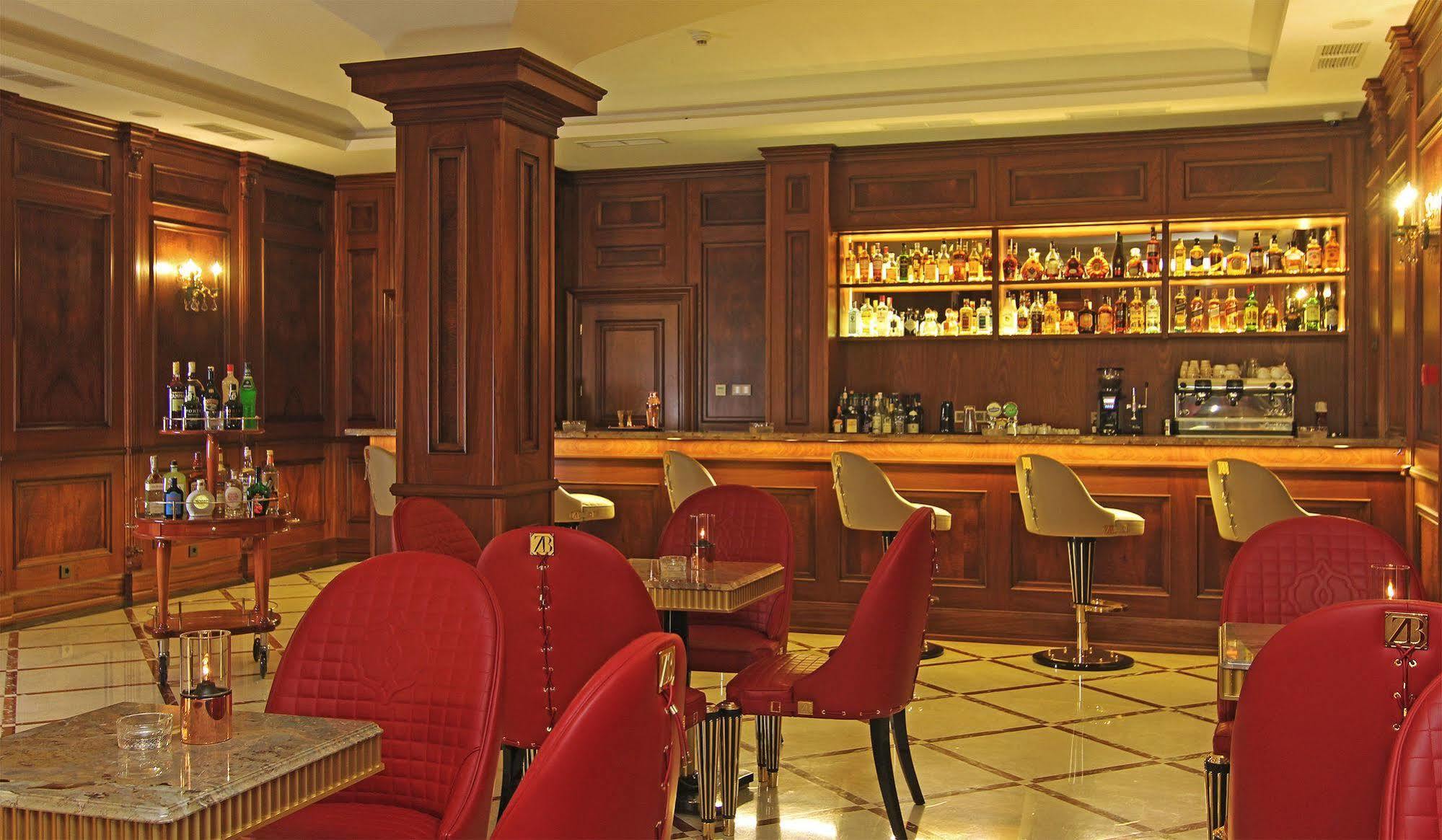 Orion Hotel Bishkek Esterno foto The bar at the Savoy