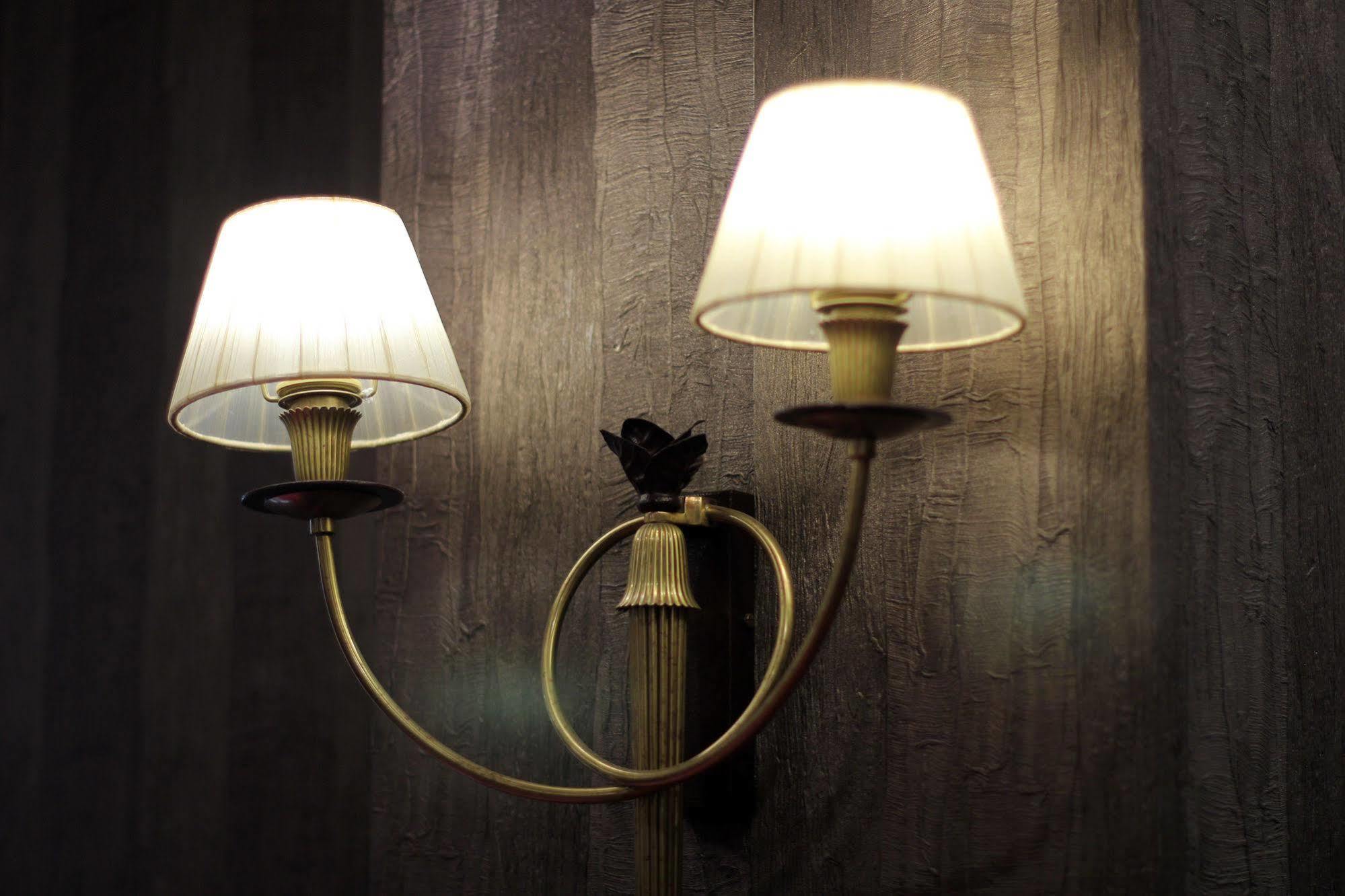 Orion Hotel Bishkek Esterno foto A wall light